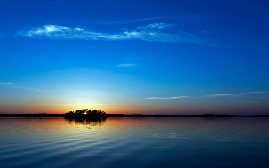 Blue Sunset Island Screen Saver Wallpaper