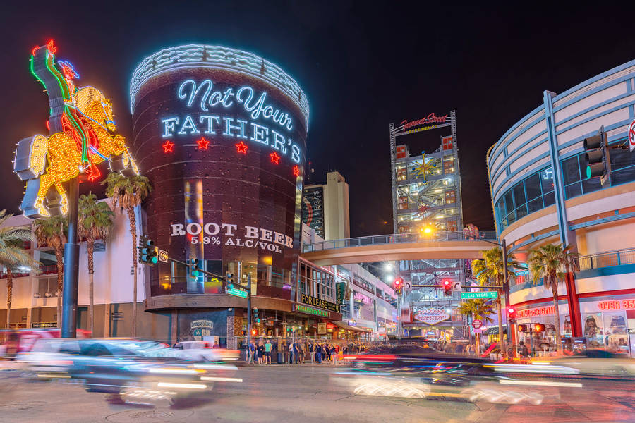 Blurry Cars In Front Fremont Street Wallpaper