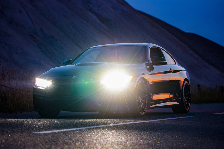 Bmw M Headlights In A Road Wallpaper