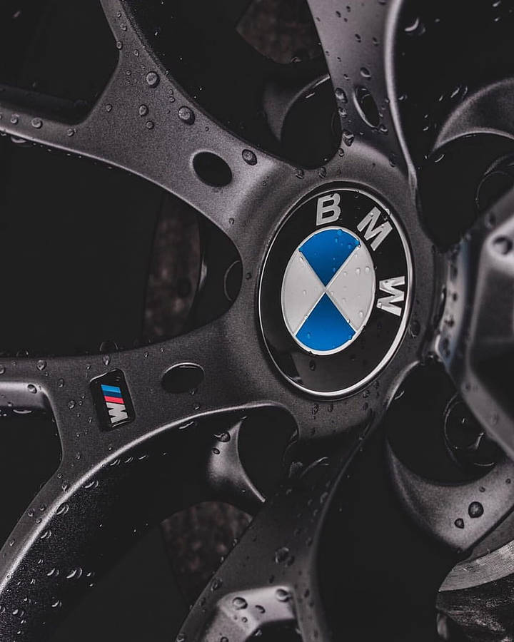 Bmw M Logo On Black Wheel Wallpaper