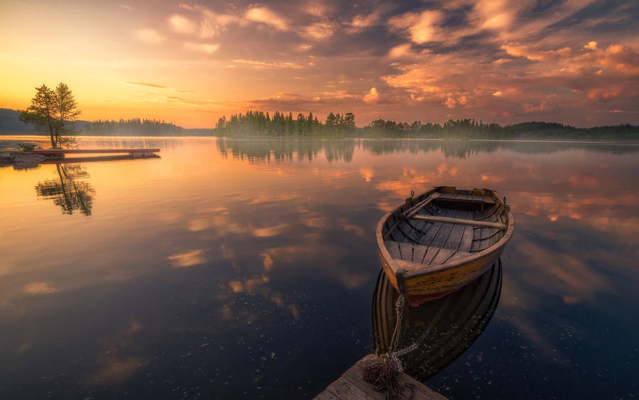 Boat At Sunset Professional Desktop Wallpaper