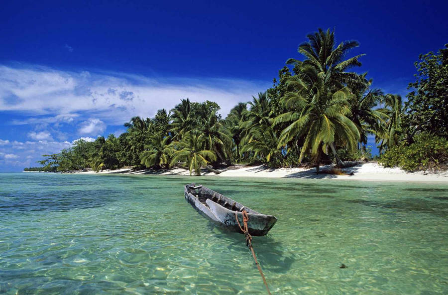 Boat By The Madadascar Beach Wallpaper