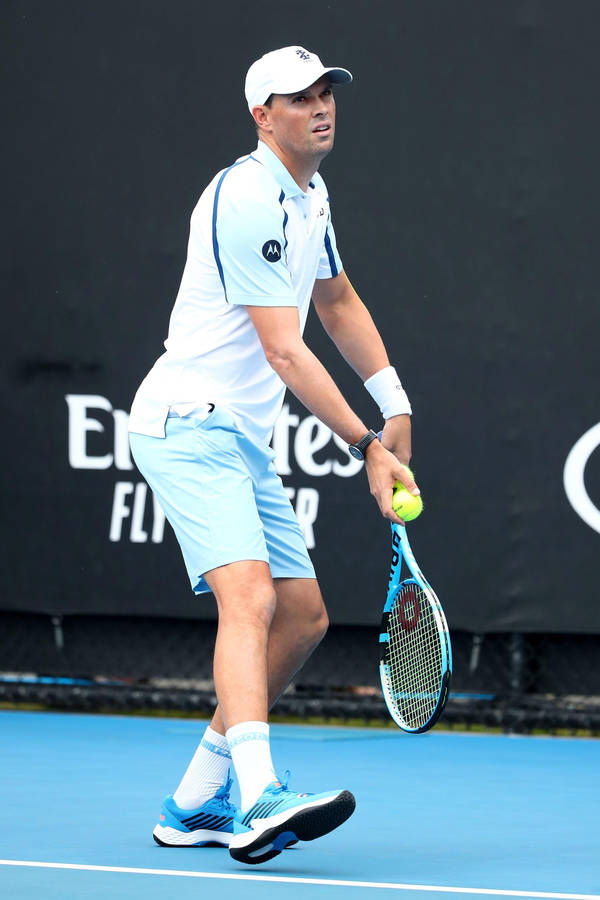 Bob Bryan Expertly Executing A Tennis Serve Wallpaper