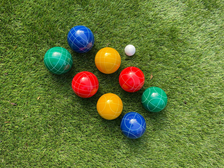 Bocce Ball On Grass Diagonal Wallpaper