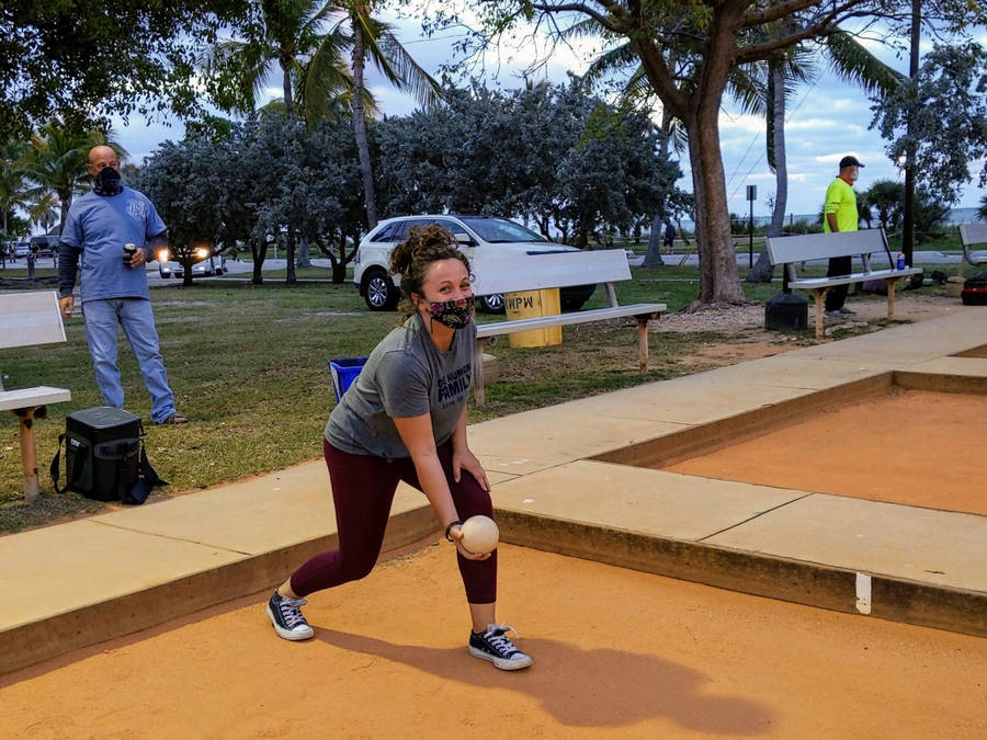 Bocce Ball People Playing At Park Wallpaper