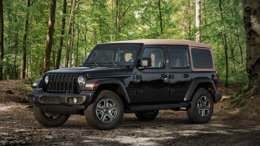 Bold And Ready: The Black Jeep Suv Wallpaper