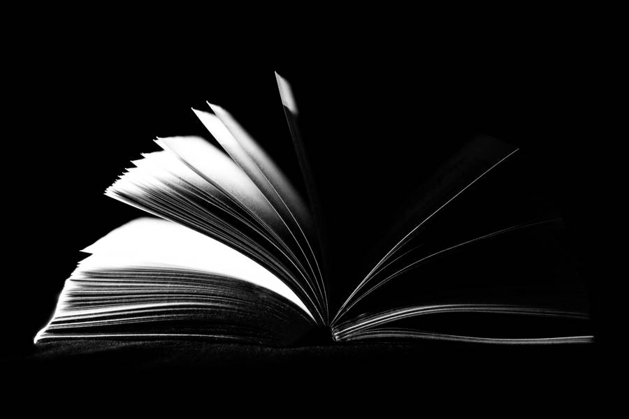 Book On Black Screen 4k Wallpaper