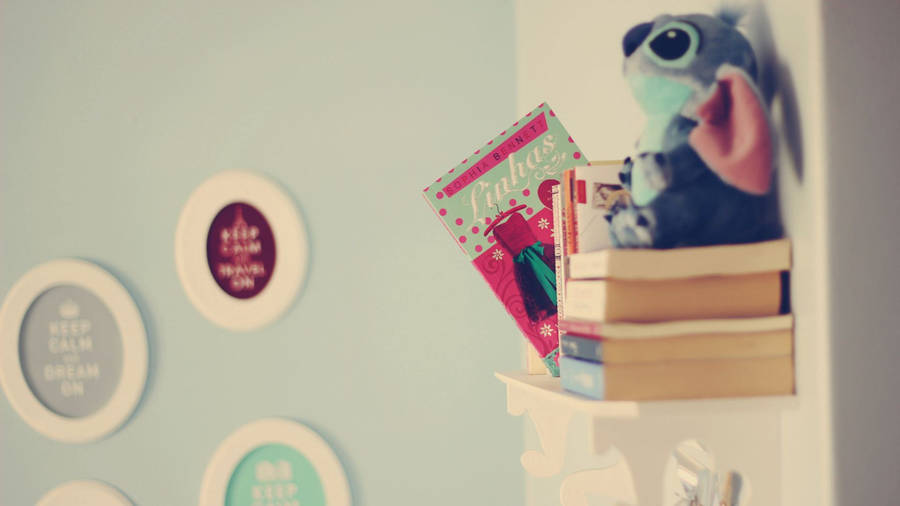 Books And Stuffed Toy Wallpaper