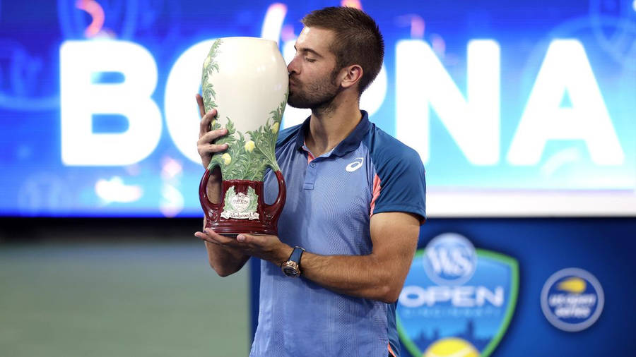 Borna Coric Kissing Trophy Wallpaper