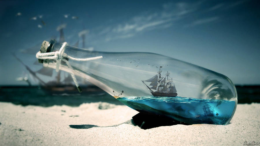 Bottled Ship On Beach Wallpaper