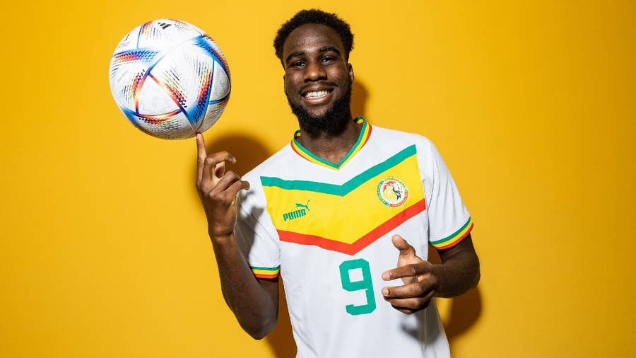 Boulaye Dia Playing For Senegal National Football Team Wallpaper