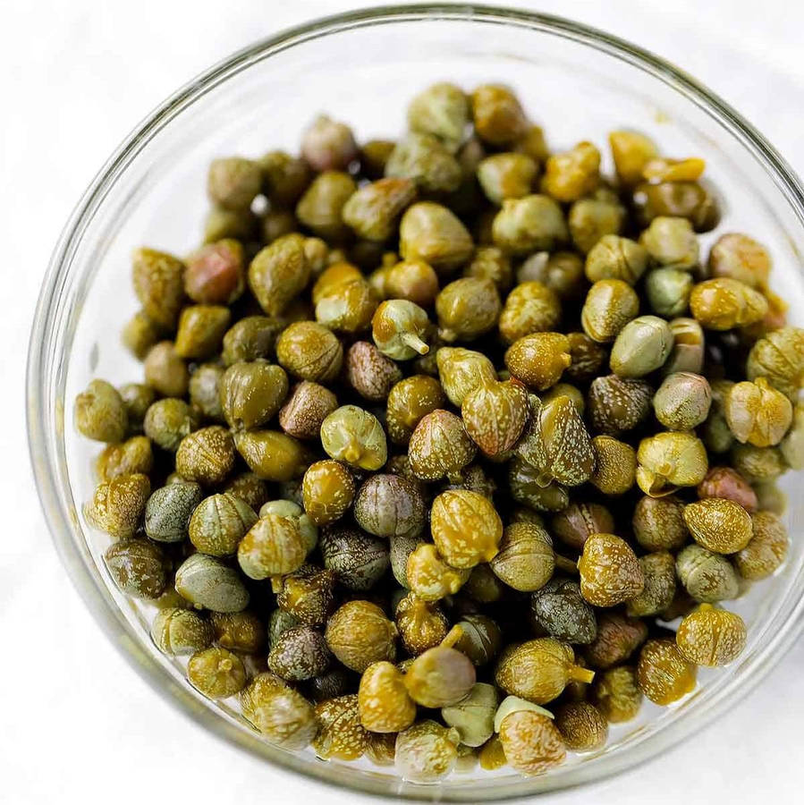 Bowl Of Green Caper Buds Wallpaper