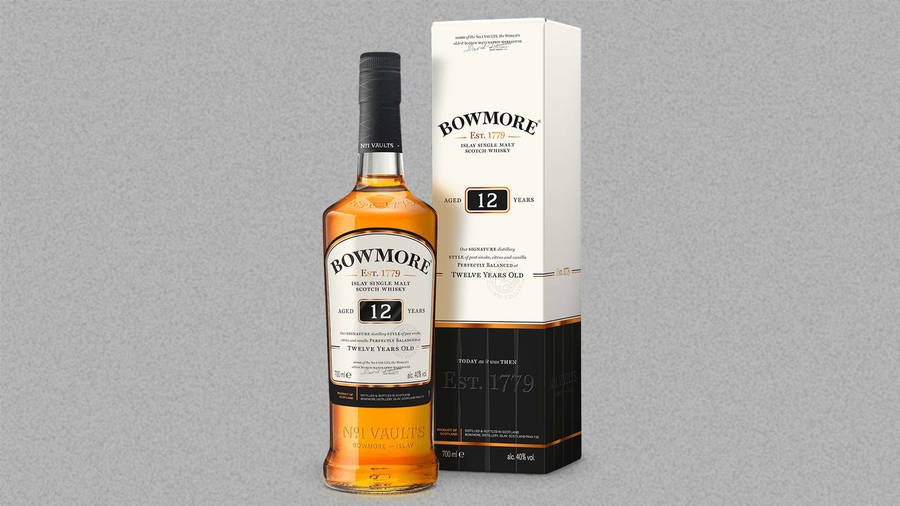 Bowmore 12 Years Old Scotch Whisky Bottle And Glass Wallpaper