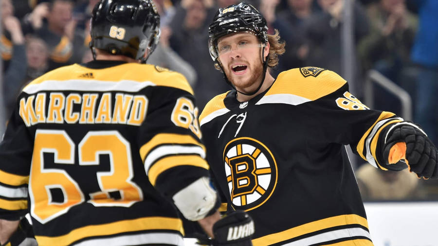 Brad Marchand With Teammate David Pastrnak Wallpaper