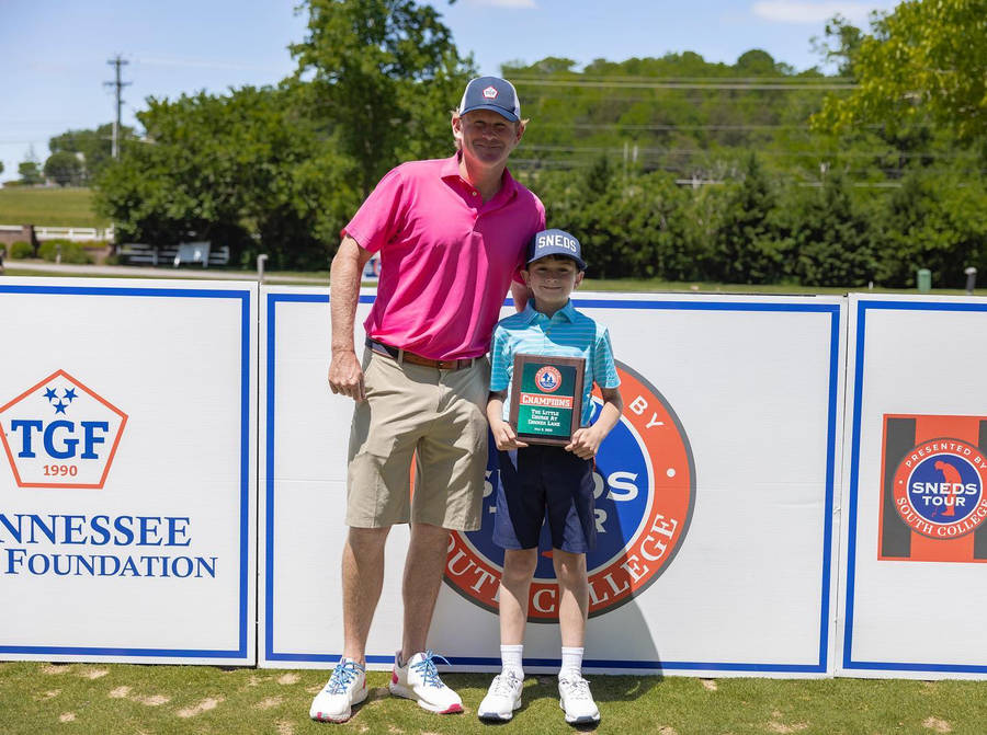 Brandt Snedeker Posing With Son Wallpaper