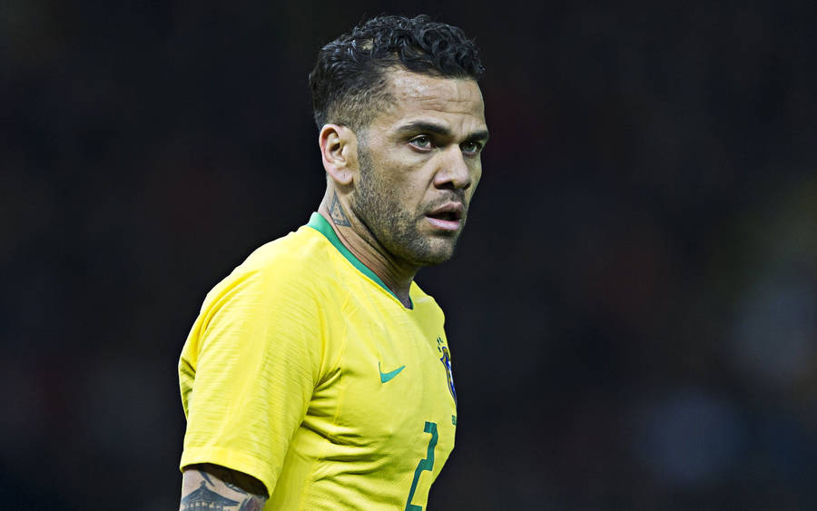 Brazil National Football Team Star - Dani Alves In Action Wallpaper