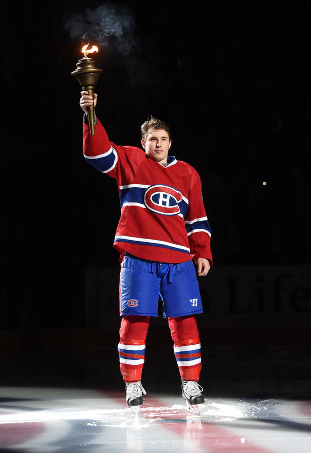 Brendan Gallagher Holding Lighted Torch Wallpaper