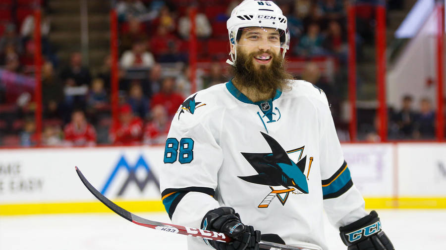 Brent Burns Smiling In His San Jose Sharks Jersey Wallpaper