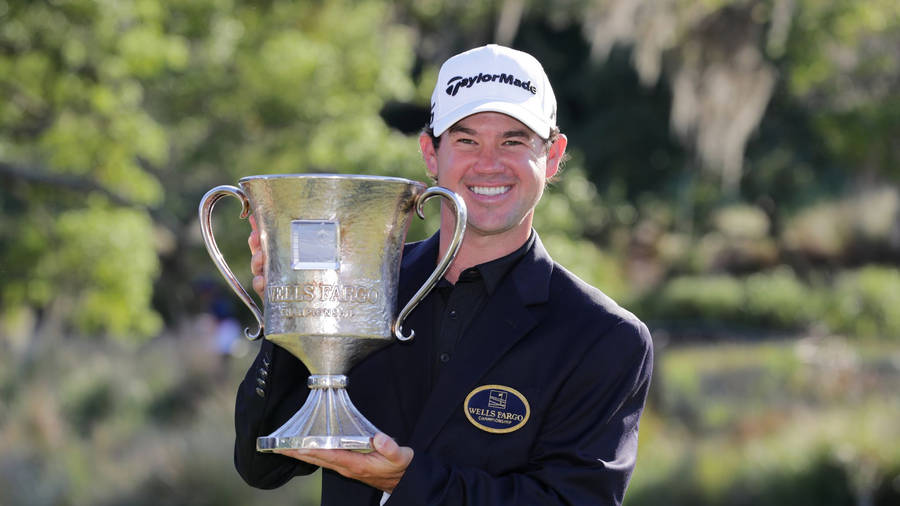 Brian Harman Grinning With Trophy Wallpaper