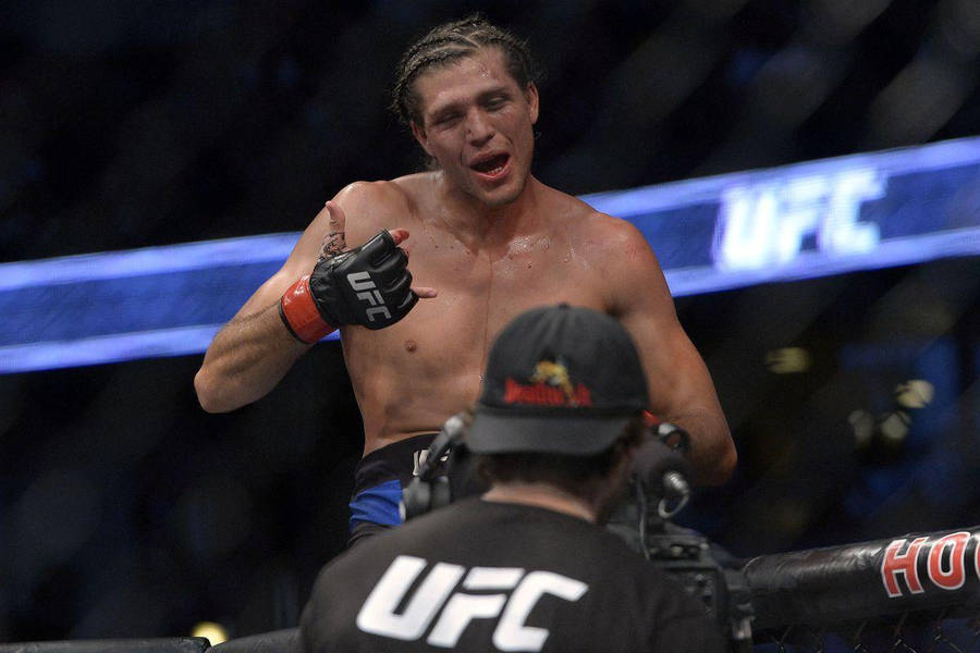 Brian Ortega Gestures To Staff Wallpaper