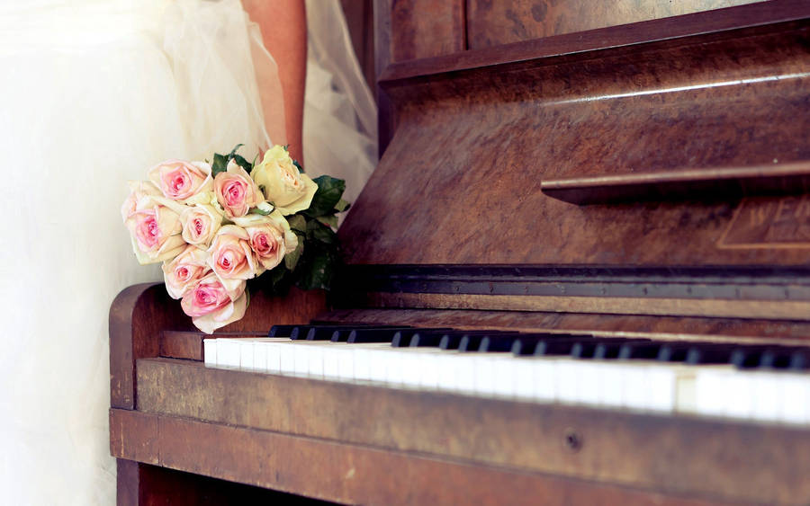 Bride And Vintage Wooden Piano Wallpaper