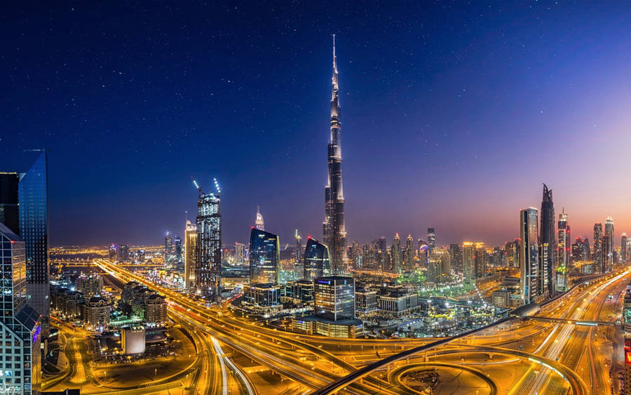 Bright Lights In Dubai And Burj Khalifa Wallpaper