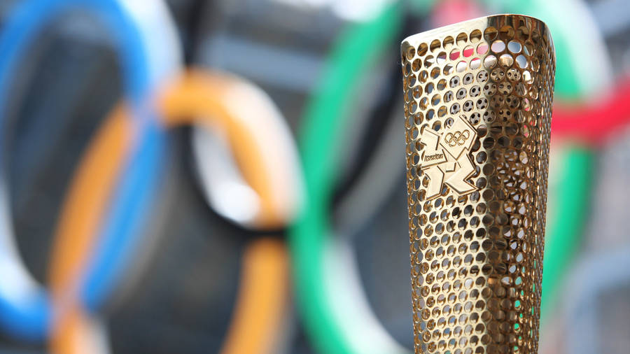 Brightly Blazing: A Close Up Look At The 2020 Tokyo Olympics Torch Wallpaper