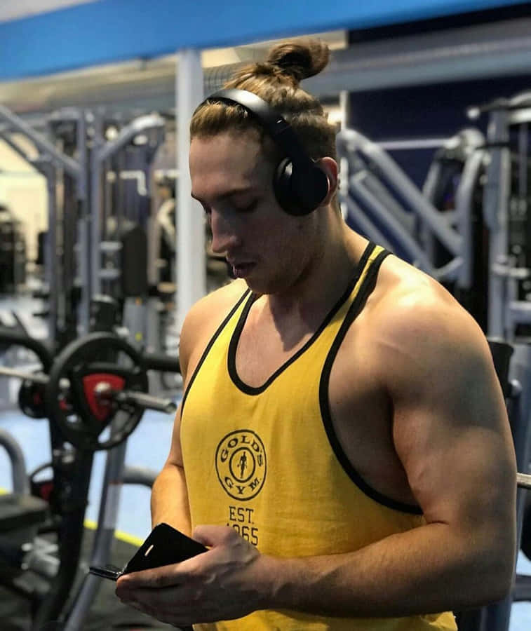 British Wrestler Pete Dunne In The Gym Wallpaper