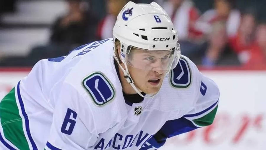 Brock Boeser In Action Against Calgary Flames Wallpaper