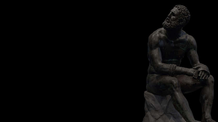 Bronze Statue Thinking Pose Wallpaper