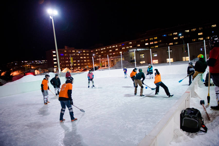 Broomball Sports Orange And Black Team Wallpaper