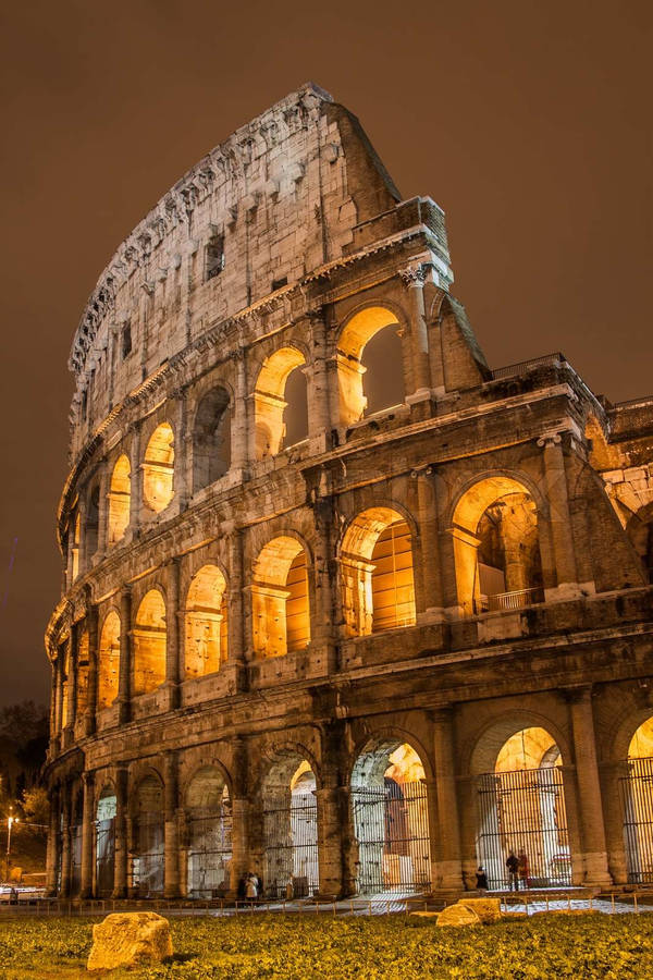 Brown Aesthetic Well-lit Roman Colosseum Wallpaper