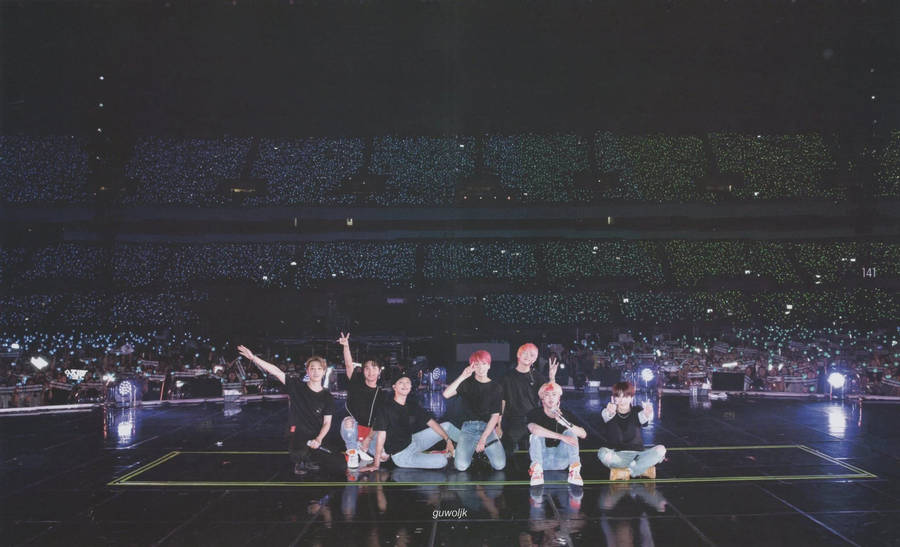 Bts Posing With Armies In A Bts Concert Wallpaper