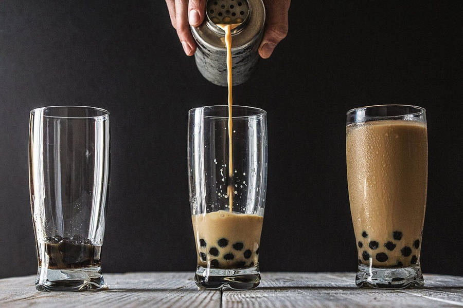 Bubble Tea Poured On Glass Wallpaper