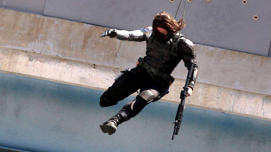 Bucky Barnes Jumping Off A Bridge Wallpaper