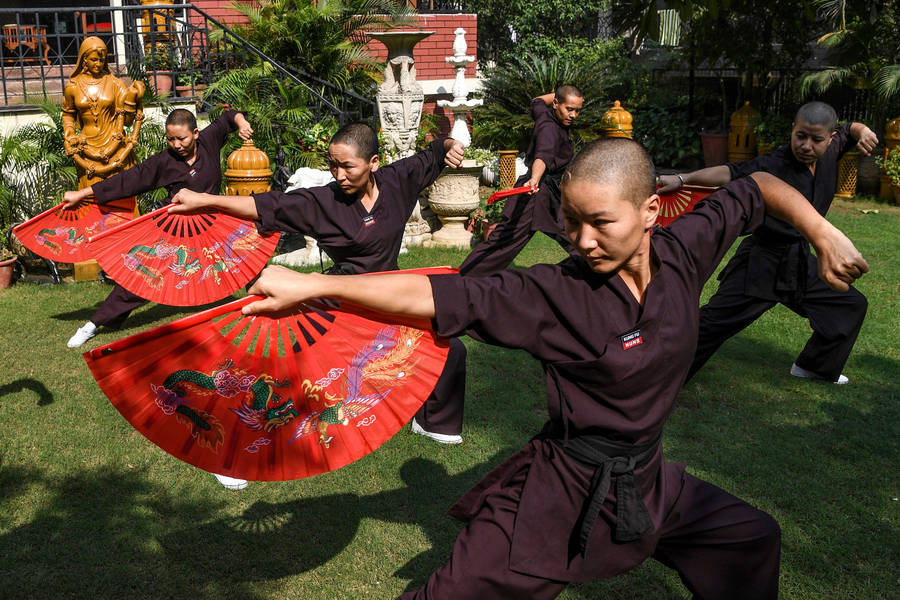 Buddhist Nuns Kung Fu Moves In New Delhi Wallpaper