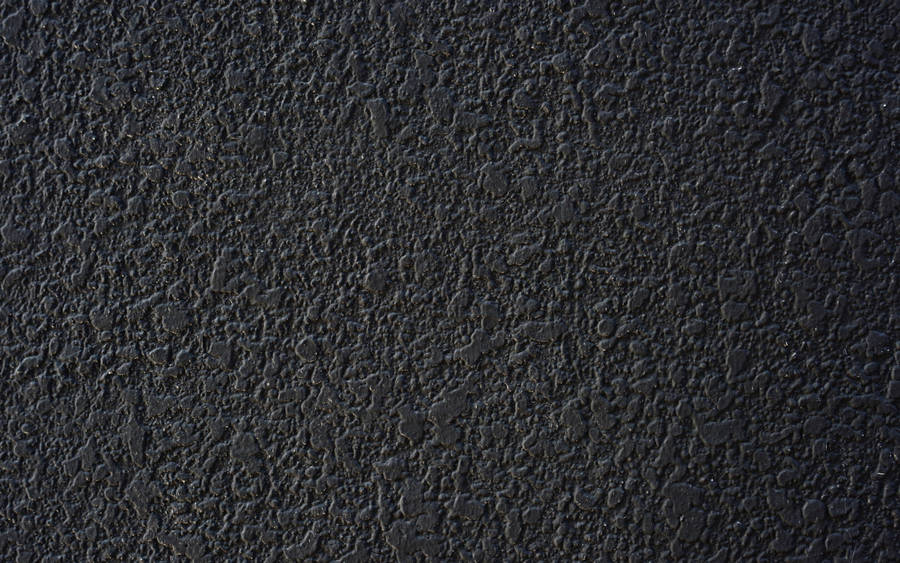 Bumpy Black Stone Wall Desktop Wallpaper