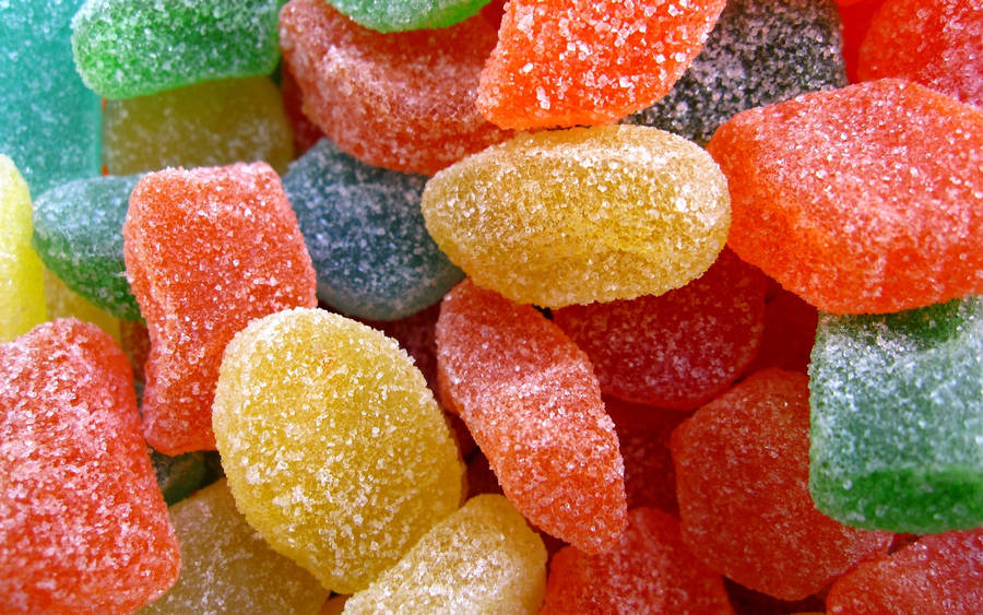 Bunch Of Sugar Candies In Multicolor Wallpaper