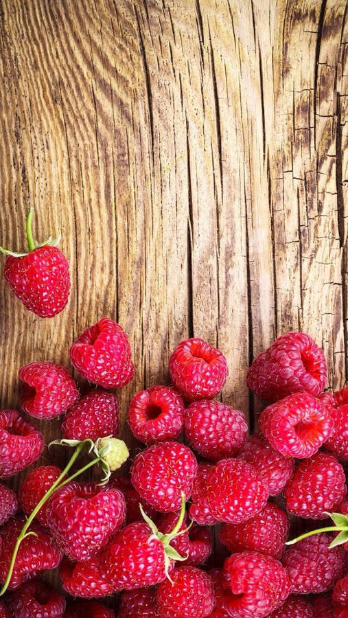 Bundle Of Red Raspberries Wallpaper