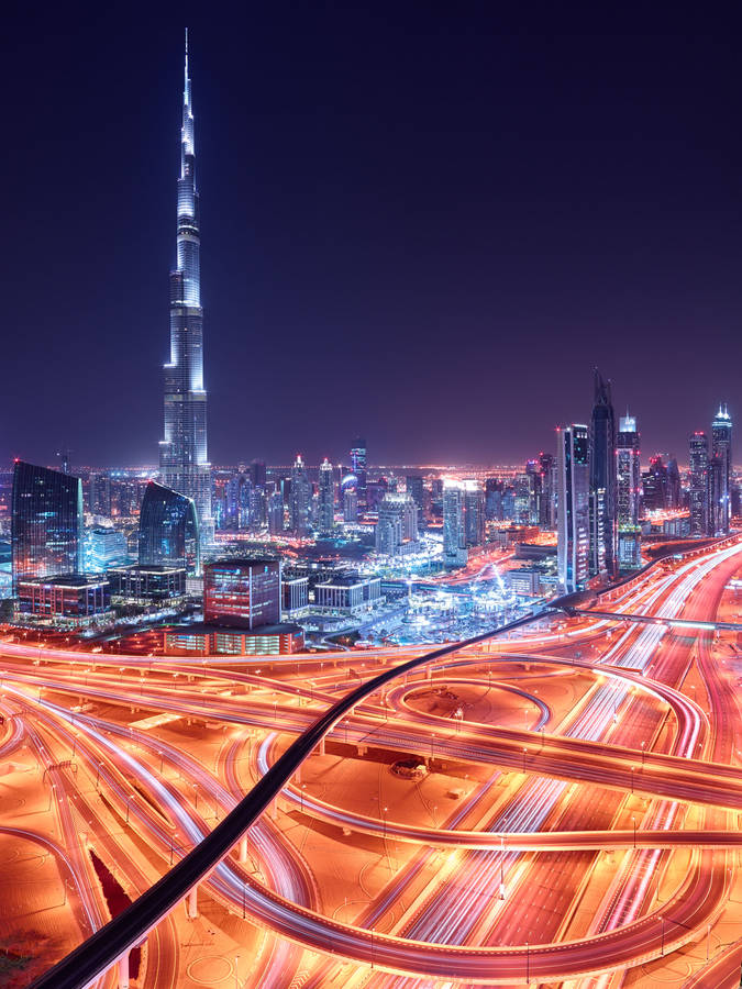 Burj Khalifa Tower In Dubai City At Night Wallpaper