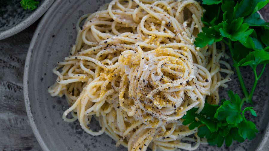 Cacio E Pepe With Fresh Garlic And Herbs Wallpaper