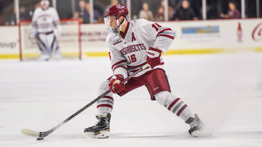 Cale Makar University Of Massachusetts Handling Puck Wallpaper