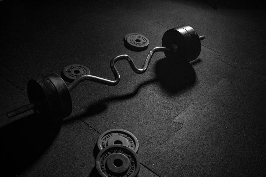 Cambered Barbell And Plates Wallpaper