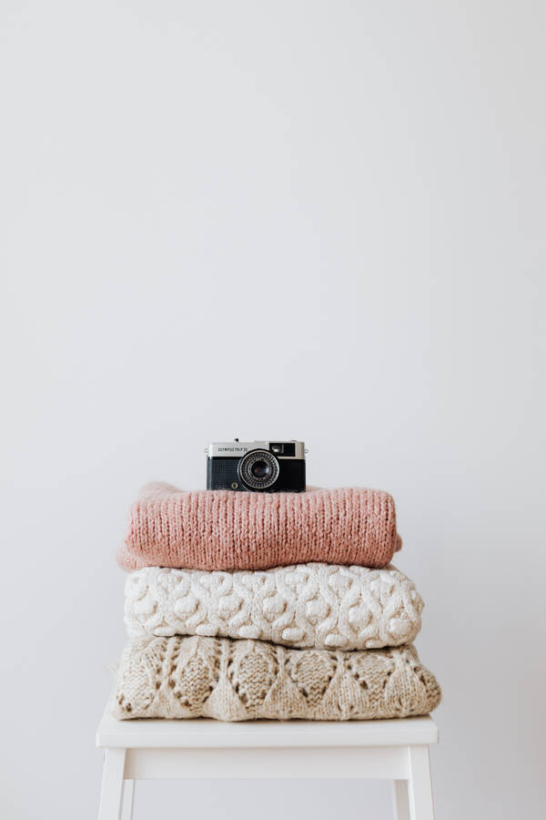 Camera Above Knitted Sweatshirt Wallpaper