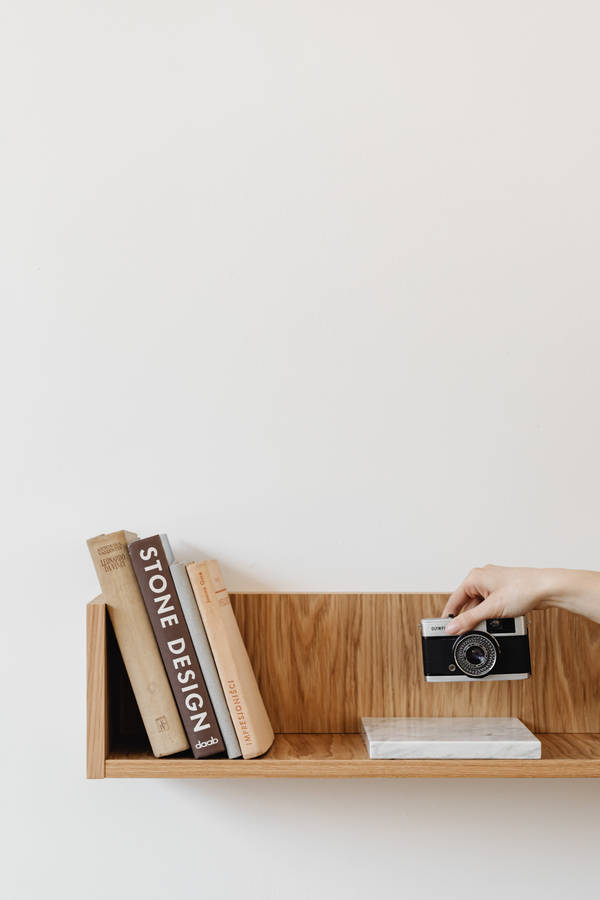 Camera On Wooden Shelf Wallpaper