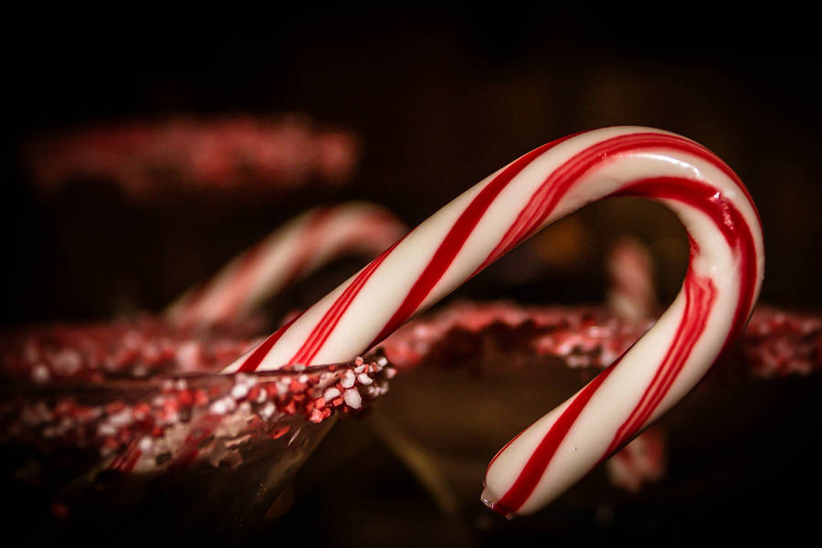 Candy Canes In Dark Background Wallpaper