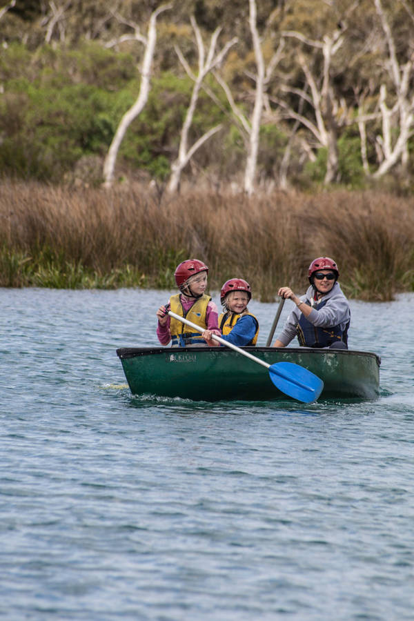 Canoeing Boat With Family Wallpaper