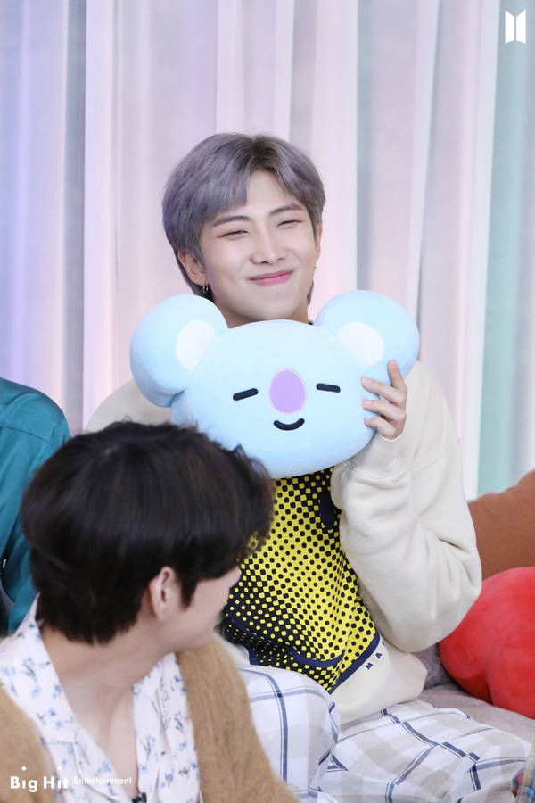 Caption: Adorable Rm Plush Toy Inspired By Bts Band Member Wallpaper