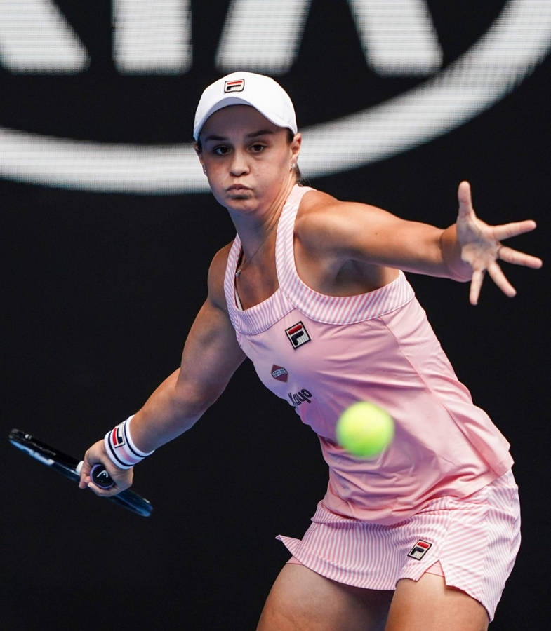 Caption: Ashleigh Barty In Action During Tennis Match Wallpaper