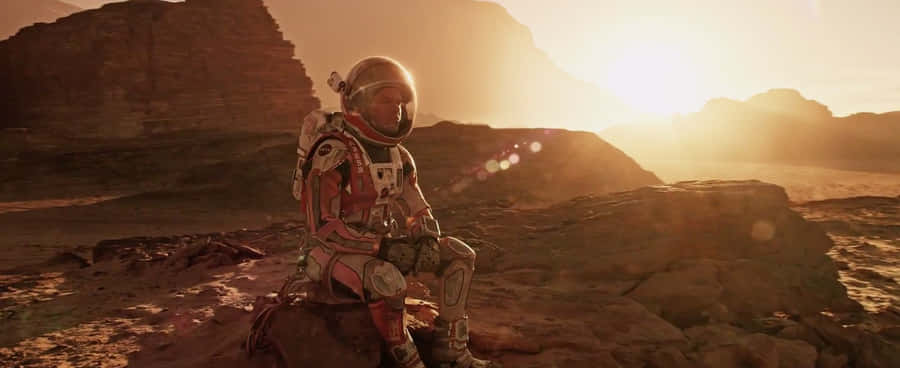 Caption: Astronaut Mark Watney Exploring Mars In The Martian Movie Wallpaper